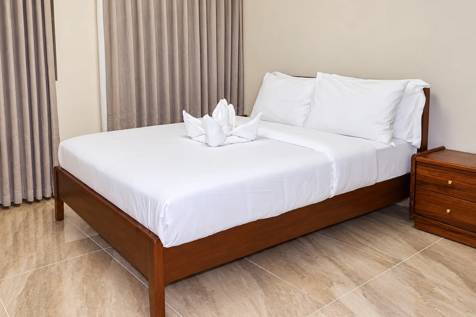 Two-Bedroom Apartment — bedroom with double bed and wardrobe