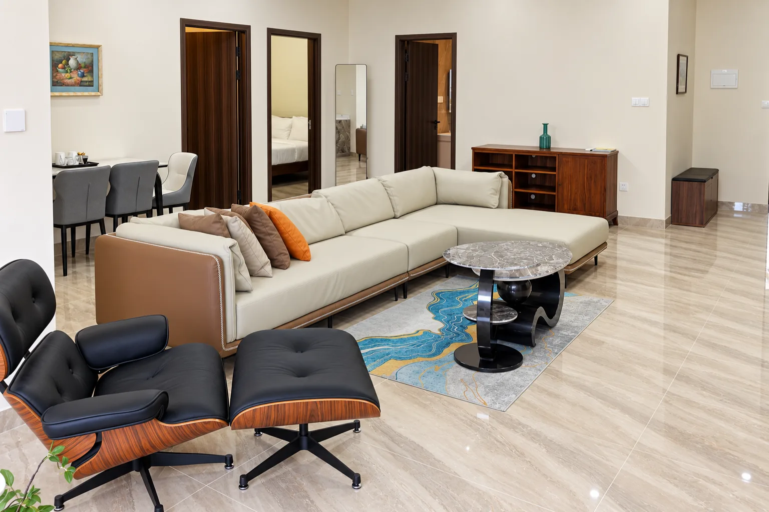 Two-Bedroom Apartment — sectional sofa, lounge chair and rug