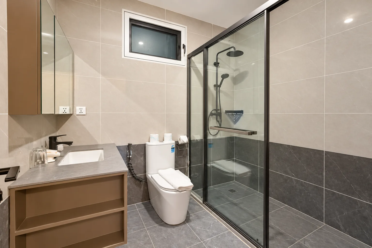 Premium Suite — bathroom with vanity and walk-in rain shower